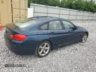 2015 BMW 4 Series 428i xDrive with VIN WBA4C9C57FD330687, listed as a Copart auction lot 67639034 with 114,779 mi miles and Salvage title. Bid and sale history available at DreamBid. Image 3.