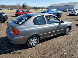2005 Hyundai Accent GLS with VIN KMHCG35C65U331867, listed as a Copart auction lot 49637495 with 63,901 mi miles and Clean Title. Bid and sale history available at carsss.com. Image 3.