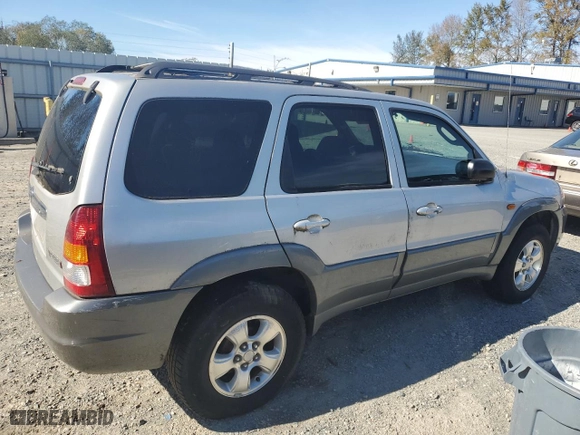 2001 Mazda Tribute LX with VIN 4F2YU08101KM57112, listed as a Copart auction lot 73372454 with 196,098 mi miles and Clean Title. Bid and sale history available at carsss.com. Image 3.