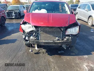 2013 Chrysler Town & Country Touring with VIN 2C4RC1BG0DR634631, listed as a IAAI auction lot 40686174 with 143,206 mi miles. Bid and sale history available at carsss.com. Image 6.