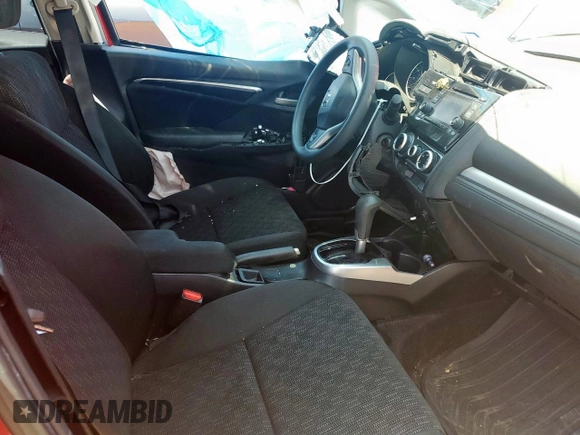 2015 Honda Fit LX z VIN 3HGGK5H55FM775973, wystawiony jako Copart lot #56454685 z przebiegiem 96 167 mil mil oraz Szkoda całkowita • Salvage title. Historia ofert i sprzedaży dostępna na DreamBid. Obrazek 7.