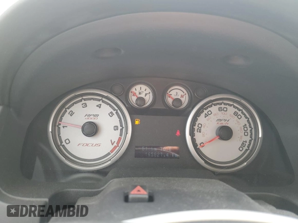 2008 Ford Focus SE z VIN 1FAHP35NX8W215744, wystawiony jako Copart lot #56096055 z przebiegiem 165 827 mil mil oraz Szkoda całkowita • Salvage title. Historia ofert i sprzedaży dostępna na DreamBid. Obrazek 9.