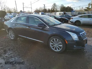 2014 Cadillac XTS with VIN 2G61L5S32E9192523, listed as a Copart auction lot 43868225 with 71,740 mi miles and Salvage Title. Bid and sale history available at carsss.com. Image 4.