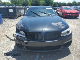2019 BMW 5 Series M550i xDrive with VIN WBAJB9C53KB289356, listed as a Copart auction lot 57814535 with 60,454 mi miles and Clean title. Bid and sale history available at DreamBid. Image 5.