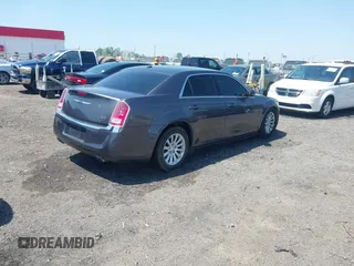 2014 Chrysler 300 with VIN 2C3CCAAG3EH237157, listed as a IAAI auction lot 41986053 with 61,372 mi miles and . Bid and sale history available at DreamBid. Image 4.