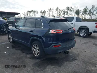 2014 Jeep Cherokee Latitude with VIN 1C4PJLCS2EW228418, listed as a IAAI auction lot 41416407 with 154,192 mi miles. Bid and sale history available at carsss.com. Image 3.
