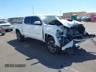 2023 Toyota Tacoma SR5 z VIN 3TYAZ5CN3PT026084, wystawiony jako IAAI lot #41644150 z przebiegiem 38 653 mil mil oraz . Historia ofert i sprzedaży dostępna na DreamBid. Obrazek 1.