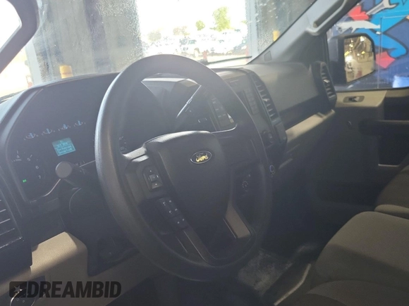 2016 Ford F-150 XLT with VIN 1FTFX1EF2GKD19438, listed as a IAAI auction lot 42610430 with 165,618 mi miles and . Bid and sale history available at DreamBid. Image 32.