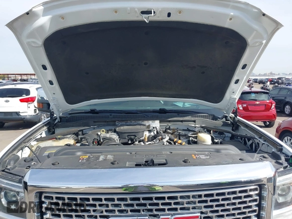 2016 GMC Sierra 2500HD Denali z VIN 1GT12UE89GF172877, wystawiony jako IAAI lot #41807741 z przebiegiem 36 719 mil mil oraz . Historia ofert i sprzedaży dostępna na DreamBid. Obrazek 10.