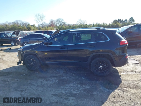 2016 Jeep Cherokee 75th Anniversary with VIN 1C4PJLCB5GW107918, listed as a IAAI auction lot 41923377 with 165,619 mi miles and . Bid and sale history available at DreamBid. Image 14.