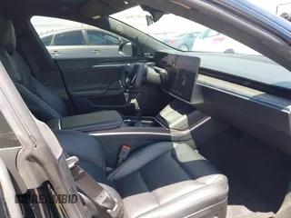 2022 Tesla Model S with VIN 5YJSA1E51NF464231, listed as a IAAI auction lot 42077838 with 53,290 mi miles and . Bid and sale history available at DreamBid. Image 5.