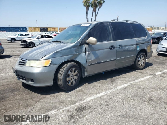 2002 Honda Odyssey EX-L with VIN 2HKRL189X2H530814, listed as a Copart auction lot 62280465 with 270,080 mi miles and Salvage title. Bid and sale history available at DreamBid. Image 1.