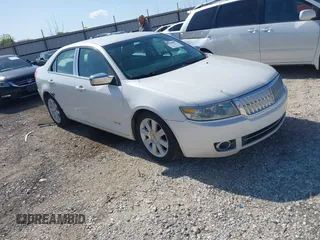 2009 Lincoln MKZ z VIN 3LNHM26T99R608497, wystawiony jako IAAI lot #42004001 z przebiegiem 101 824 mil mil oraz . Historia ofert i sprzedaży dostępna na DreamBid. Obrazek 1.