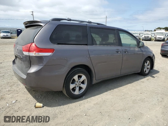 2014 Toyota Sienna LE AAS with VIN 5TDKK3DC6ES491574, listed as a Copart auction lot 59815785 with 189,975 mi miles and Salvage title. Bid and sale history available at DreamBid. Image 3.