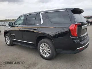 2022 GMC Yukon SLT with VIN 1GKS2BKD0NR290942, listed as a Copart auction lot 82338794 with 26,392 mi miles and Salvage Title. Bid and sale history available at carsss.com. Image 2.