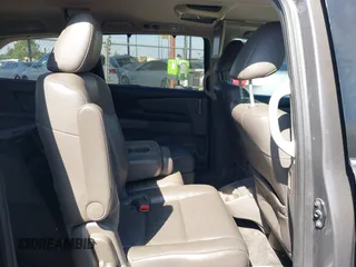 2012 Honda Odyssey EX-L with VIN 5FNRL5H65CB012428, listed as a IAAI auction lot 42164272 with 256,253 mi miles and . Bid and sale history available at carsss.com. Image 8.