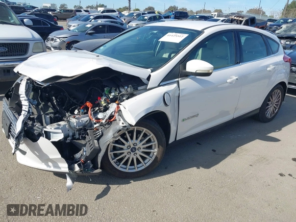 2013 Ford Focus Electric z VIN 1FADP3R42DL196988, wystawiony jako IAAI lot #41632025 z przebiegiem 72 578 mil mil oraz . Historia ofert i sprzedaży dostępna na DreamBid. Obrazek 2.