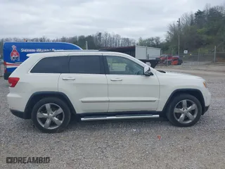 2012 Jeep Grand Cherokee Overland with VIN 1C4RJFCGXCC263065, listed as a IAAI auction lot 41942110 with 189,681 mi miles. Bid and sale history available at carsss.com. Image 14.