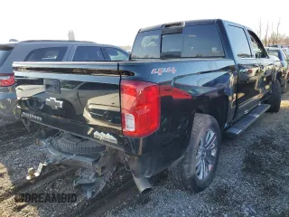 2016 Chevrolet Silverado 1500 High Country with VIN 3GCUKTEC4GG149954, listed as a Copart auction lot 82769224 with 130,820 mi miles and Salvage Title. Bid and sale history available at DreamBid. Image 3.