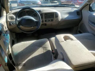 2000 Ford F-150 XL with VIN 1FTRX18W7YNA67100, listed as a Copart auction lot 78982114 with 0 mi miles and Salvage Title. Bid and sale history available at carsss.com. Image 8.