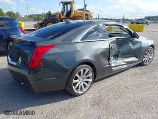 2016 Cadillac ATS Coupe Luxury Collection AWD with VIN 1G6AH1RX6G0109787, listed as a IAAI auction lot 41151839 with 71,573 mi miles. Bid and sale history available at carsss.com. Image 4.