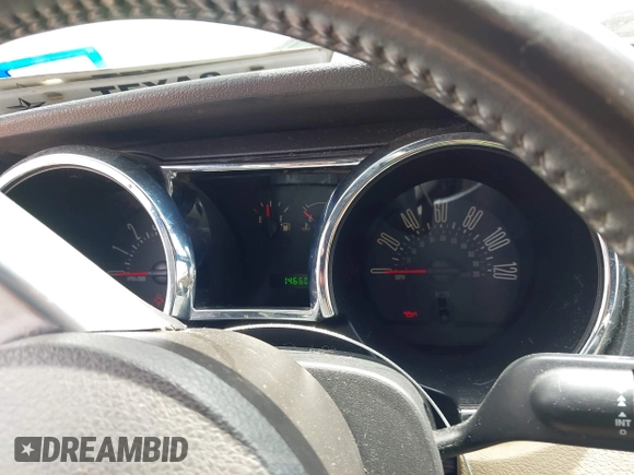 2009 Ford Mustang with VIN 1ZVHT84N595112837, listed as a IAAI auction lot 42383859 with 146,605 mi miles and . Bid and sale history available at DreamBid. Image 7.