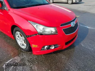 2014 Chevrolet Cruze 1LT z VIN 1G1PC5SBXE7468987, wystawiony jako IAAI lot #42391846 z przebiegiem 184 102 mil mil oraz . Historia ofert i sprzedaży dostępna na DreamBid. Obrazek 6.