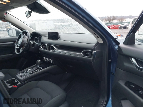 2019 Mazda CX-5 Sport with VIN JM3KFBBM5K0668678, listed as a IAAI auction lot 41811146 with 102,634 mi miles and . Bid and sale history available at DreamBid. Image 5.