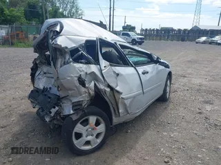 2006 Ford Focus S with VIN 1FAFP37N06W165504, listed as a IAAI auction lot 42300119 with Not provided miles and . Bid and sale history available at DreamBid. Image 4.