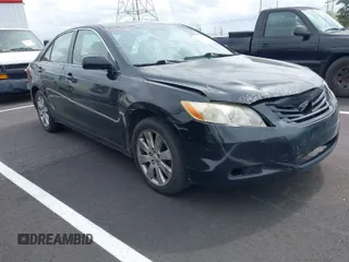 2007 Toyota Camry CE with VIN JTNBE46K473057431, listed as a IAAI auction lot 41941811 with 245,059 mi miles. Bid and sale history available at carsss.com. Image 1.