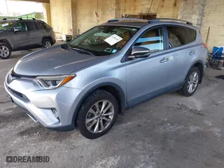 2018 Toyota RAV4 Limited with VIN 2T3DFREV4JW709049, listed as a IAAI auction lot 41596609 with 50,860 mi miles. Bid and sale history available at carsss.com. Image 17.
