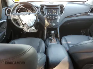 2017 Hyundai Santa Fe 2.0T z VIN 5XYZUDLA3HG397569, wystawiony jako Copart lot #77360944 z przebiegiem 145 512 mil mil oraz Szkoda całkowita • Salvage title. Historia ofert i sprzedaży dostępna na DreamBid. Obrazek 8.