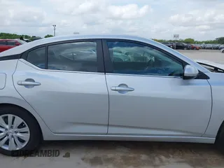 2023 Nissan Sentra S z VIN 3N1AB8BV7PY311515, wystawiony jako IAAI lot #42038589 z przebiegiem 13 907 mil mil oraz . Historia ofert i sprzedaży dostępna na DreamBid. Obrazek 14.