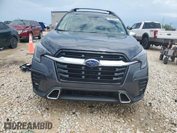 2023 Subaru Ascent Touring с VIN 4S4WMAWD7P3421717, выставлен на аукционе Copart как лот 55840935 с пробегом 24 051 миль миль и Списание • Salvage title. История ставок и продаж доступна на DreamBid. Изображение 5.