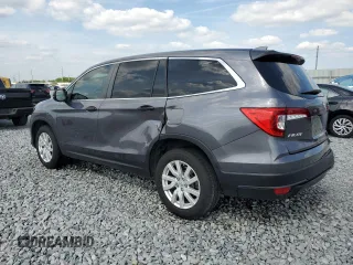 2019 Honda Pilot LX with VIN 5FNYF5H19KB016889, listed as a Copart auction lot 53972975 with 75,721 mi miles and Salvage Title. Bid and sale history available at DreamBid. Image 2.