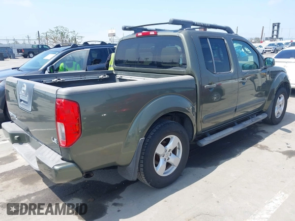 2005 Nissan Frontier LE with VIN 1N6AD07U05C449750, listed as a IAAI auction lot 42658701 with 104,630 mi miles and . Bid and sale history available at DreamBid. Image 4.