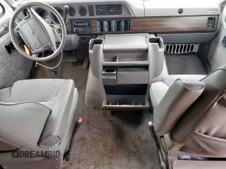 1996 Dodge Passenger z VIN 2B5WB35Z8TK146557, wystawiony jako Copart lot #56897975 z przebiegiem 31 999 mil mil oraz Tytuł czysty. Historia ofert i sprzedaży dostępna na DreamBid. Obrazek 8.