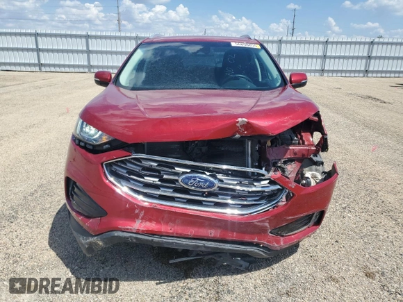 2020 Ford Edge SEL с VIN 2FMPK4J96LBA06946, выставлен на аукционе Copart как лот 56898855 с пробегом 54 984 миль миль и Списание • Salvage title. История ставок и продаж доступна на DreamBid. Изображение 5.