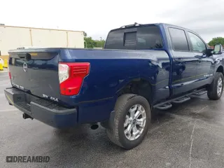2023 Nissan Titan XD PRO-4X with VIN 1N6AA1FB9PN106795, listed as a IAAI auction lot 41987240 with 38,107 mi miles. Bid and sale history available at carsss.com. Image 4.