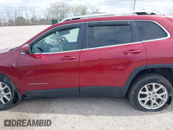 2014 Jeep Cherokee Latitude with VIN 1C4PJLCS3EW143362, listed as a IAAI auction lot 42150037 with 86,012 mi miles. Bid and sale history available at carsss.com. Image 14.