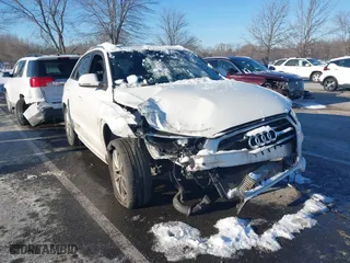 2017 Audi Q3 Premium with VIN WA1ECCFS9HR017842, listed as a IAAI auction lot 41400330 with 106,884 mi miles. Bid and sale history available at carsss.com. Image 1.