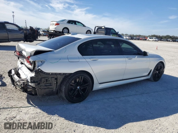 2019 BMW 7 Series 750i с VIN WBA7F0C51KGM24718, выставлен на аукционе Copart как лот 86527984 с пробегом 2 900 миль миль и Списание • Salvage title. История ставок и продаж доступна на DreamBid. Изображение 3.
