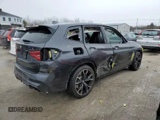 2021 BMW X3 M with VIN 5YMTS0C03M9F04458, listed as a Copart auction lot 42162245 with 52,156 mi miles and Salvage Title. Bid and sale history available at carsss.com. Image 3.