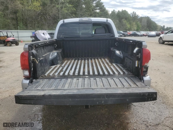 2020 Toyota Tacoma 4WD SR5 with VIN 3TMCZ5AN6LM310312, listed as a Copart auction lot 50162955 with 82,710 mi miles and Salvage Title. Bid and sale history available at carsss.com. Image 6.