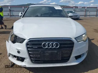 2015 Audi A6 Premium Plus with VIN WAUGFAFC9FN042616, listed as a IAAI auction lot 42496917 with 100,943 mi miles and . Bid and sale history available at DreamBid. Image 18.