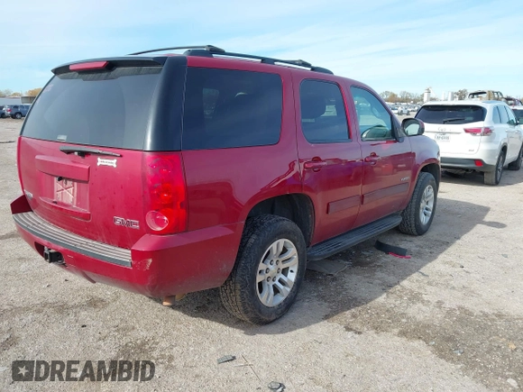 2013 GMC Yukon SLE with VIN 1GKS1AE07DR309832, listed as a IAAI auction lot 41014906 with 203,346 mi miles. Bid and sale history available at carsss.com. Image 4.