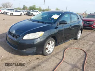 2009 Toyota Matrix with VIN 2T1KU40E69C091858, listed as a IAAI auction lot 41925490 with 153,161 mi miles. Bid and sale history available at carsss.com. Image 2.