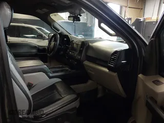 2018 Ford F-150 XL with VIN 1FTEW1EP5JFC37436, listed as a IAAI auction lot 41807561 with 133,159 mi miles and . Bid and sale history available at carsss.com. Image 5.