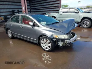 2009 Honda Civic LX z VIN 2HGFA16569H310017, wystawiony jako IAAI lot #41447927 z przebiegiem 258 238 mil mil oraz . Historia ofert i sprzedaży dostępna na DreamBid. Obrazek 1.