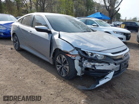 2018 Honda Civic Sedan LX with VIN 2HGFC2F5XJH573938, listed as a IAAI auction lot 42098109 with 69,037 mi miles. Bid and sale history available at carsss.com. Image 1.